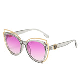 Cat-eye frame sunglasses with metal decoration