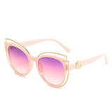 Cat-eye frame sunglasses with metal decoration