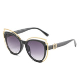 Cat-eye frame sunglasses with metal decoration