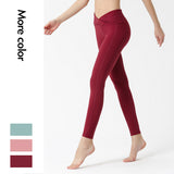 Front waist cross exposed navel nude feeling comfortable and fit-fitting sports yoga pants women's high-elastic nylon fitness pants
