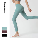 Nylon nude side pocket yoga pants hollow stitching hip-lifting tight-fitting sports running fitness pants