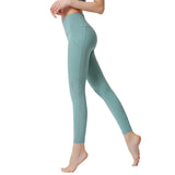 Nylon nude side pocket yoga pants hollow stitching hip-lifting tight-fitting sports running fitness pants