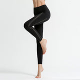 Nylon nude side pocket yoga pants hollow stitching hip-lifting tight-fitting sports running fitness pants