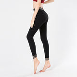 Beautiful waist stitching yoga pants with pockets high-waist elastic beam feet nine-point running fitness pants