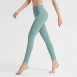Sports hip-lifting yoga pants side hollow hip-lifting fitness running pants