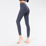 Beautiful waist stitching yoga pants with pockets high-waist elastic beam feet nine-point running fitness pants